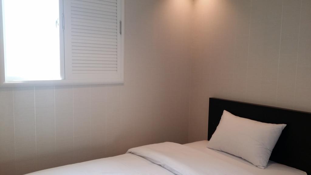 New Suwon Hotel Pokoj fotografie