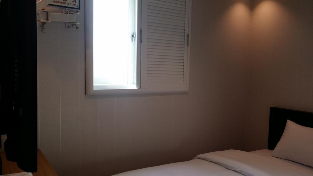 New Suwon Hotel Pokoj fotografie
