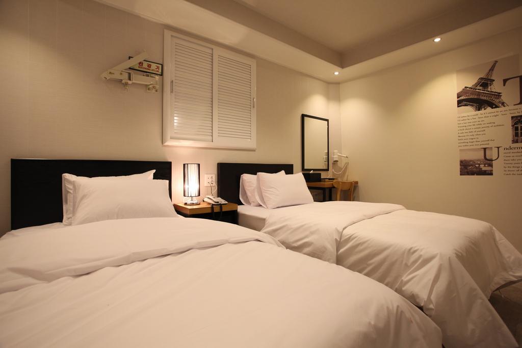 New Suwon Hotel Pokoj fotografie