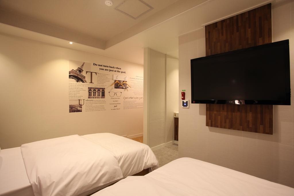 New Suwon Hotel Pokoj fotografie